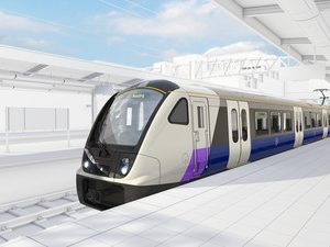 Render of a Class 345 train within a wireframe render of a station platform